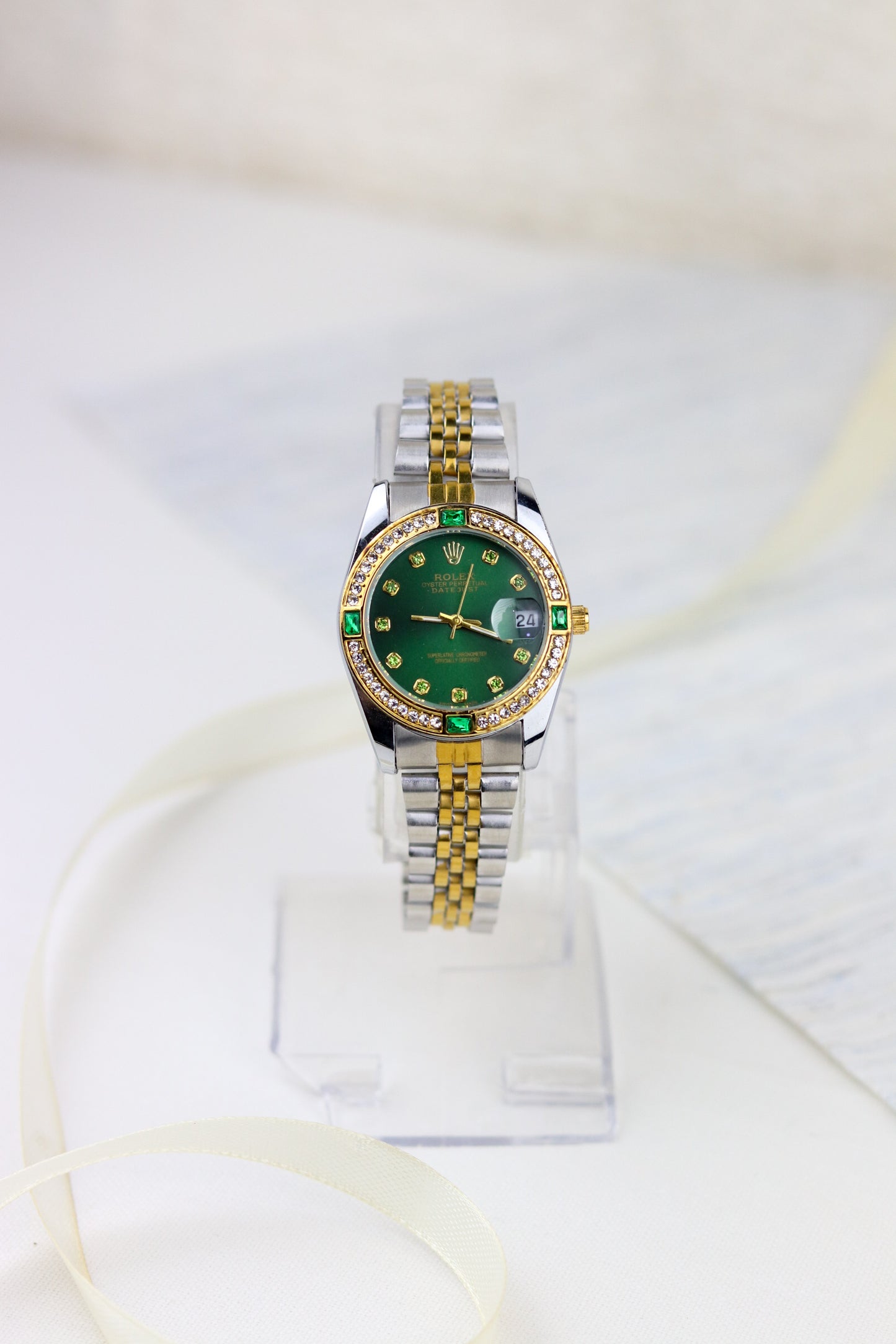 Rol-ex Gilded Green Datejust Watch