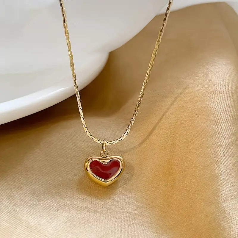 Red heart necklace with a gold-toned chain