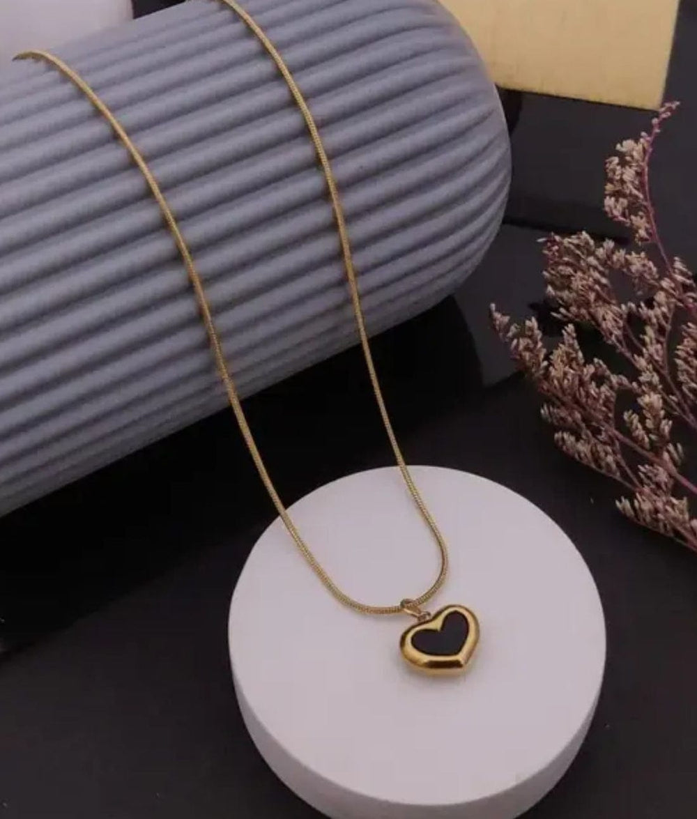 black heart necklace with a gold-toned chain