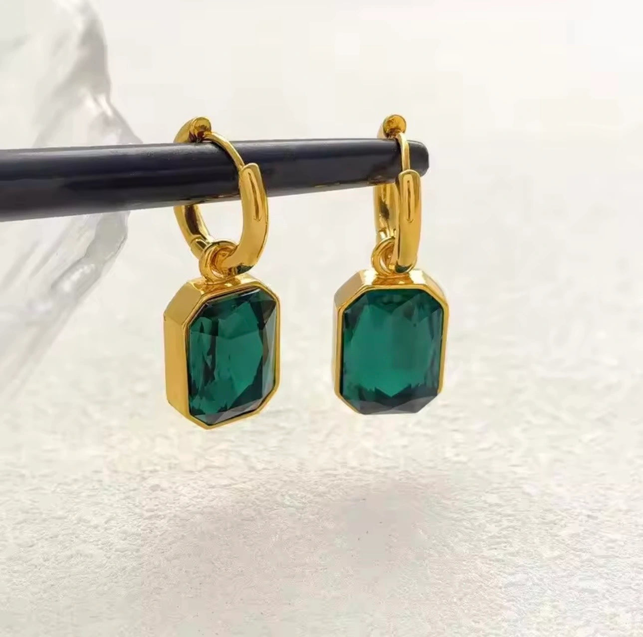 Woman wearing Emerald Hanging Earrings festive look Pakistan
